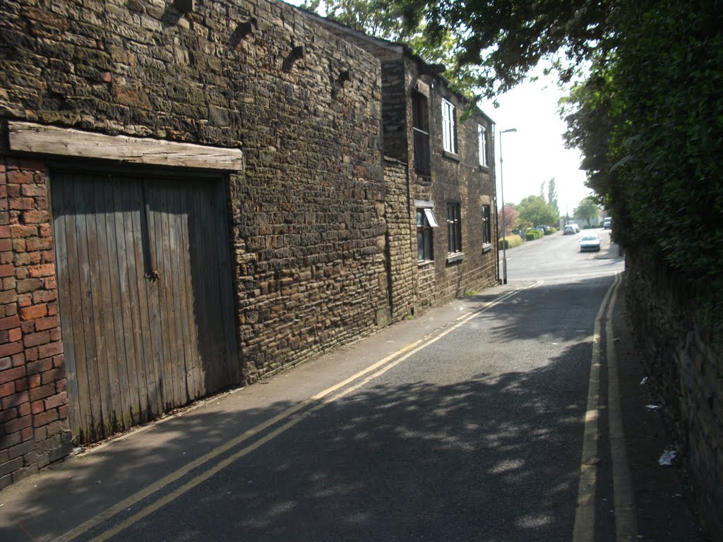 old building on back lane.