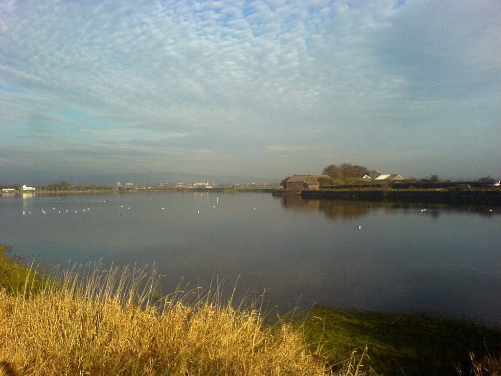Radcliffe Old Hall farm across Elton Reservoir