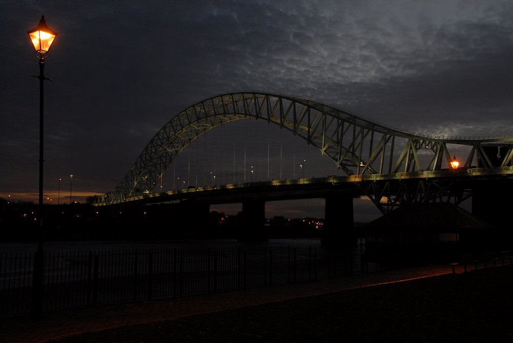 The Bridge at dusk by lamplight
