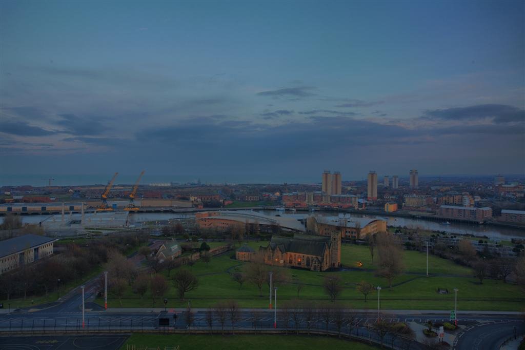Monkwearmouth district St Peters church and the University of Sunderland Media centre, Sunderland, England