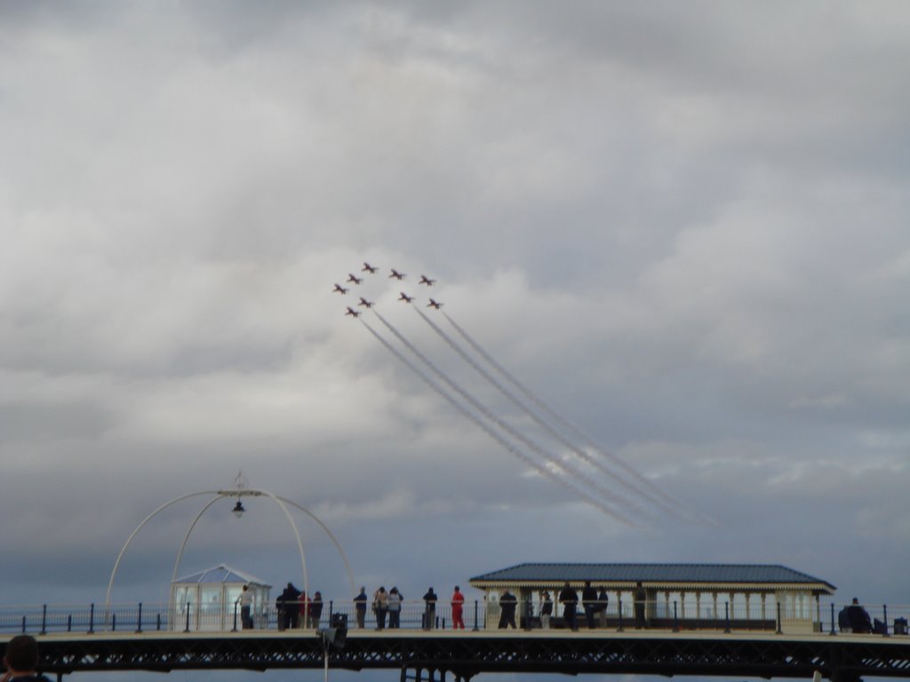 red arrows above southport pier
