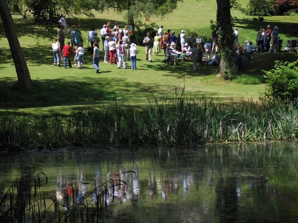 Local pagans gathering for the Ring of Power ritual by the waters of the Sacred Grove, Randwick, UK