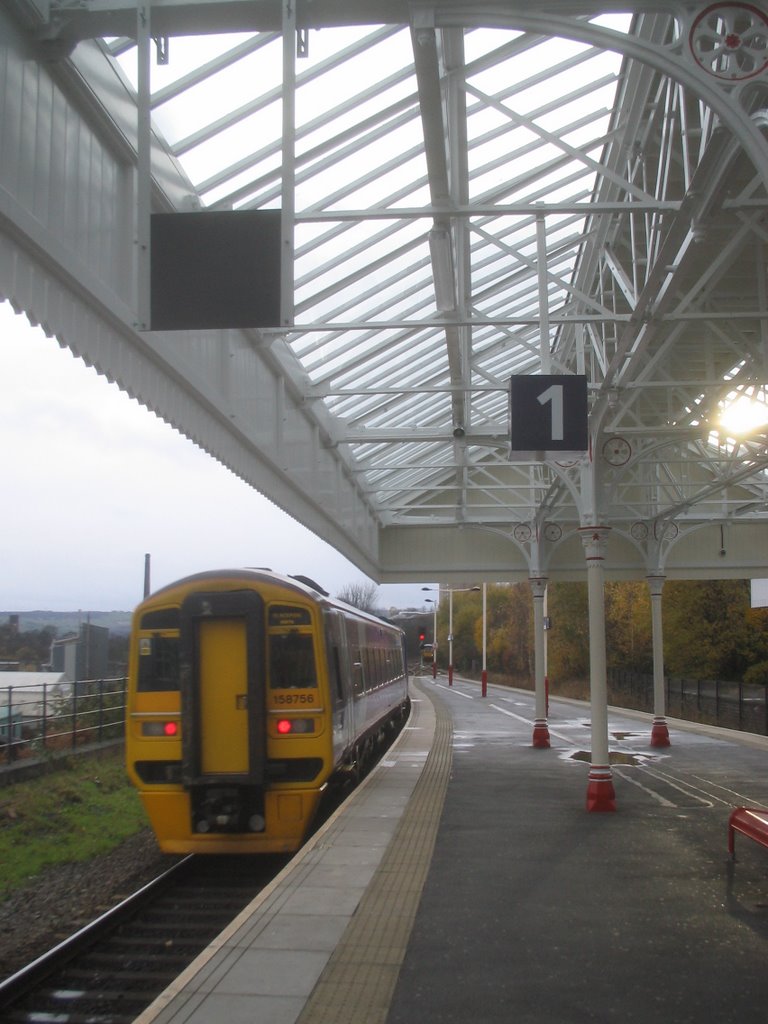 The Manchester train leaves Halifax station.