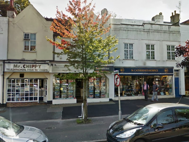 Outside Hamptons International Lettings houses to rent on 28 The Broadway in Haywards Heath