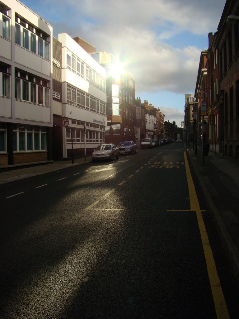 Queen Street looking towards sun reflecting off building in Bank Street, Sheffield S1