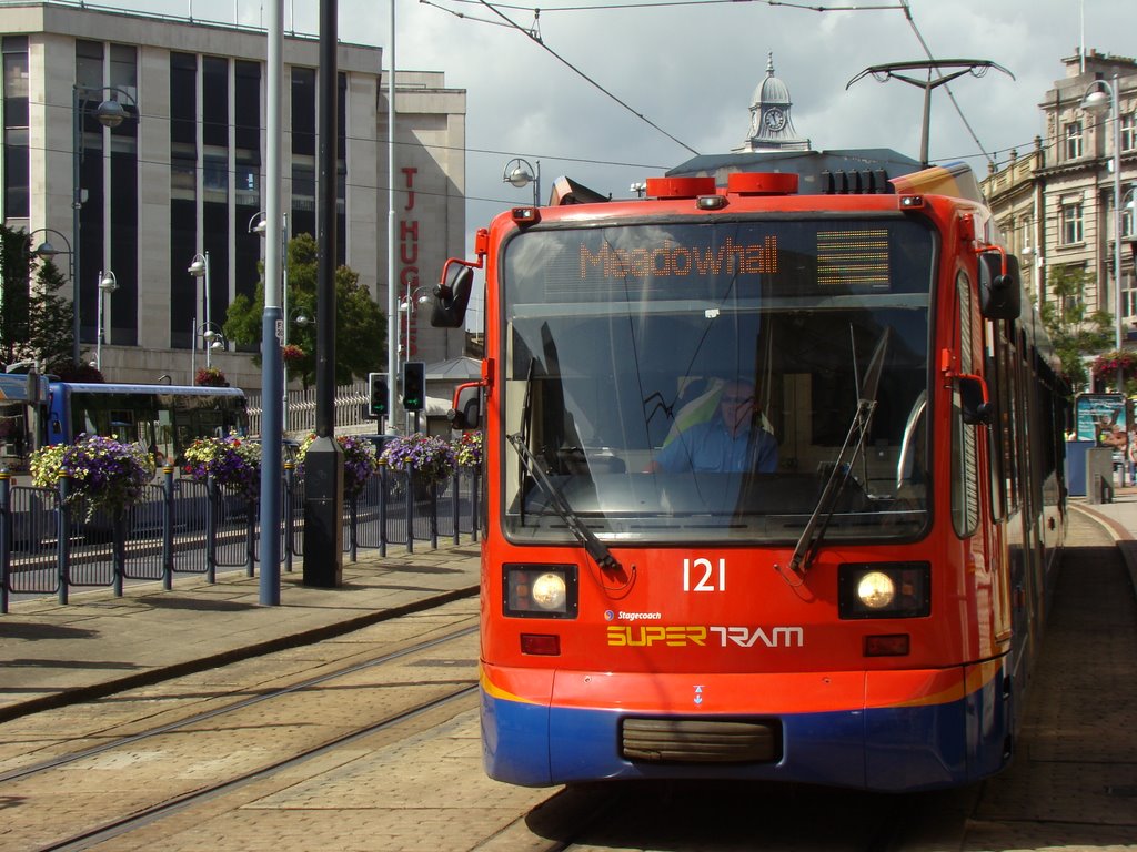 Meadowhall bound Supertram on High Street, Sheffield S1