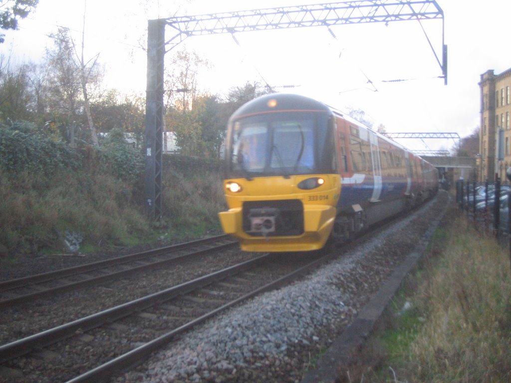 Bradford train leaving Saltaire station