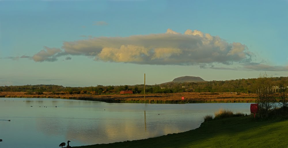 Sunset over the Ecos Center lake, looking towards Slemish