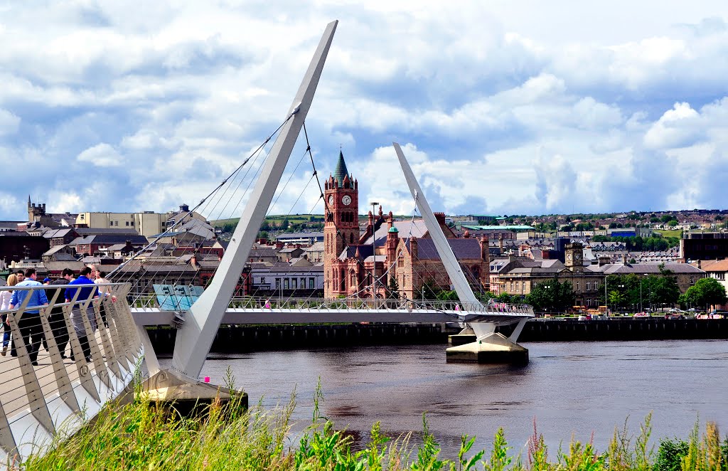 Northern Ireland. Derry~Londonderry. Triple A for Londonderry:  A peace bridge. A guild hall. A foyle river :)