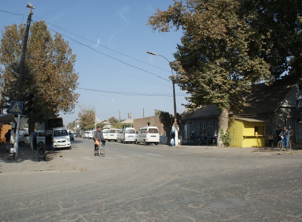 Chinese Mini-vans at Kolkhozabad main Street waiting for clients to Dushanbe