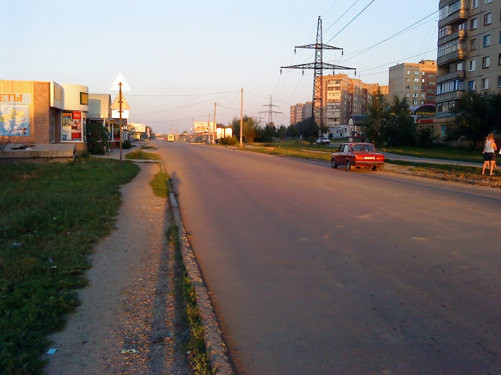 На закате.