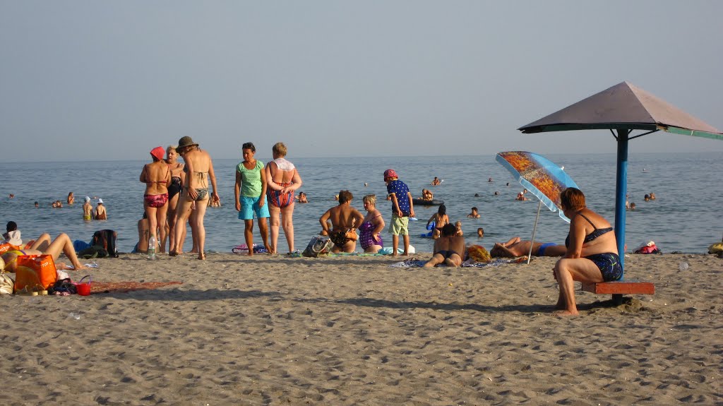 море, пісок, небо і люди ..