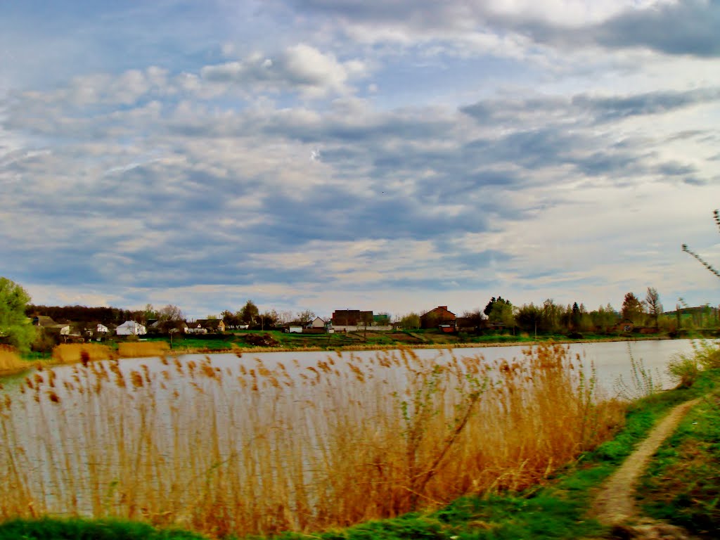 23.04.2012 17:27  Дорога Р04. Улица Розы Люксембург. Переезд через водоем реки Котлуй возле завода "Мотор".