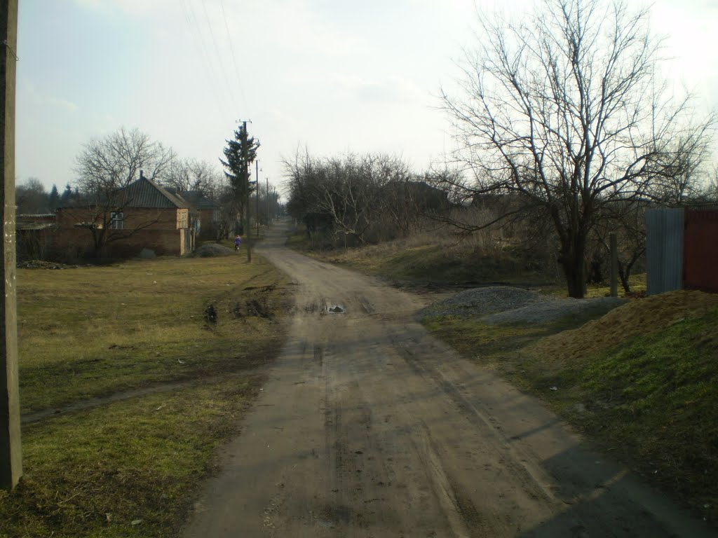 до краю села