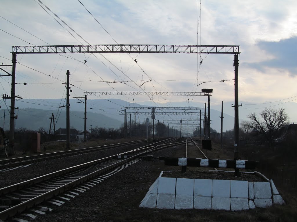 на переїзді
