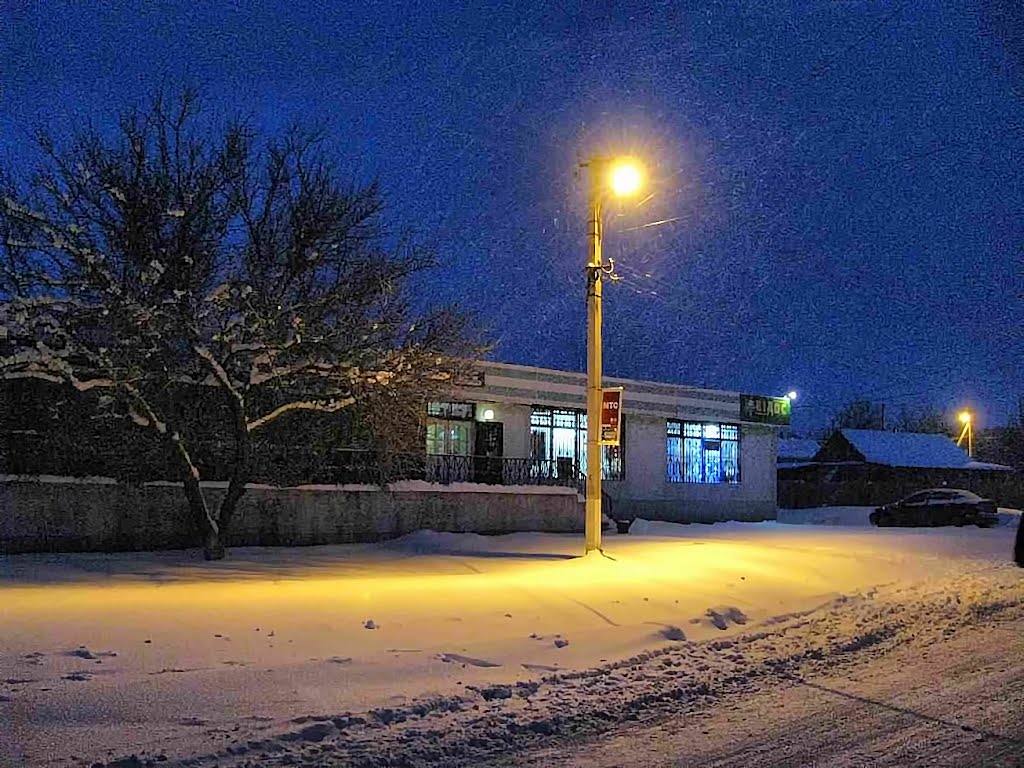 The street lights, shop ...