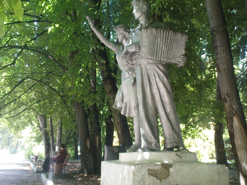Monument soviet youth in town park city Pervomaysk Ukraine