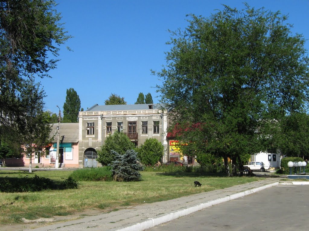 ►В центре