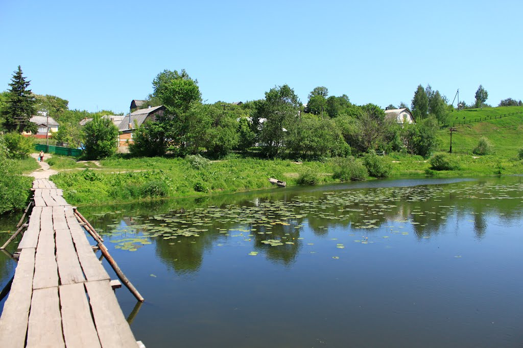Korets. The view from the wooden bridge across the Korchik river.