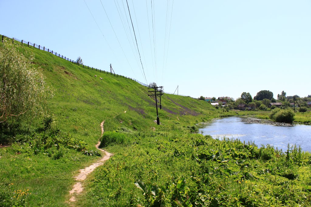 Korets. The view with the river Korchik and the jewish cemetery upon its higher  bank.